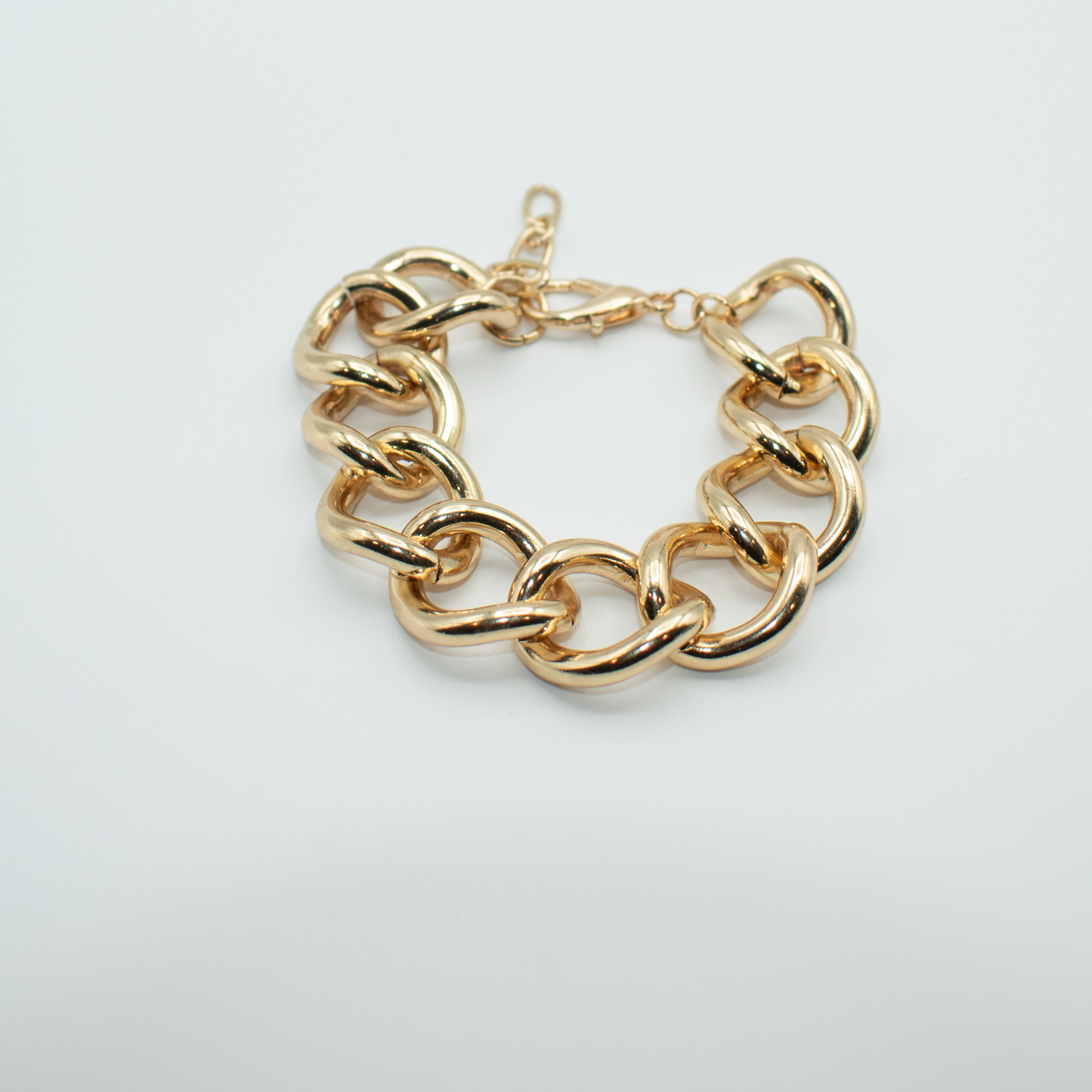 Gold Plated Bracelet Chunky Cable Chain Design Adjustable Lobster Clasp Closure Approx. 6.5in. Extends to 9in 1.5oz Imported Lead Compliant You will receive a free: Storage box or bag and cleaning cloth with 