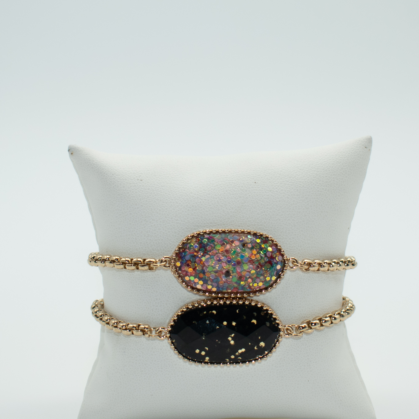 PRODUCT DETAIL Gold Plated Chain Adjustable Closure Multicolor or Black Focal Stone 0.5oz Imported Lead and Nickel Compliant You will receive a free: Storage box or bag and cleaning cloth with this purchase.