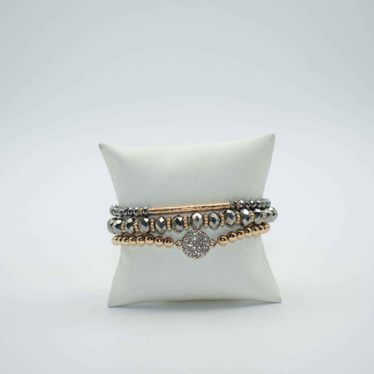 PRODUCT DETAILS 3 Layer Bracelet Stack Mixed beads with Metal Rhinestone charm 60% glass, 20% Plastic, 20% Metal Green and Gold Color or Gray and Gold Stretch Approx. 9” Diameter 2.5” 0.8 oz. Imported Loose fit Please measure your wrist before you make your purchase for an accurate fit. You will receive a free: Storage box or bag and cleaning cloth.