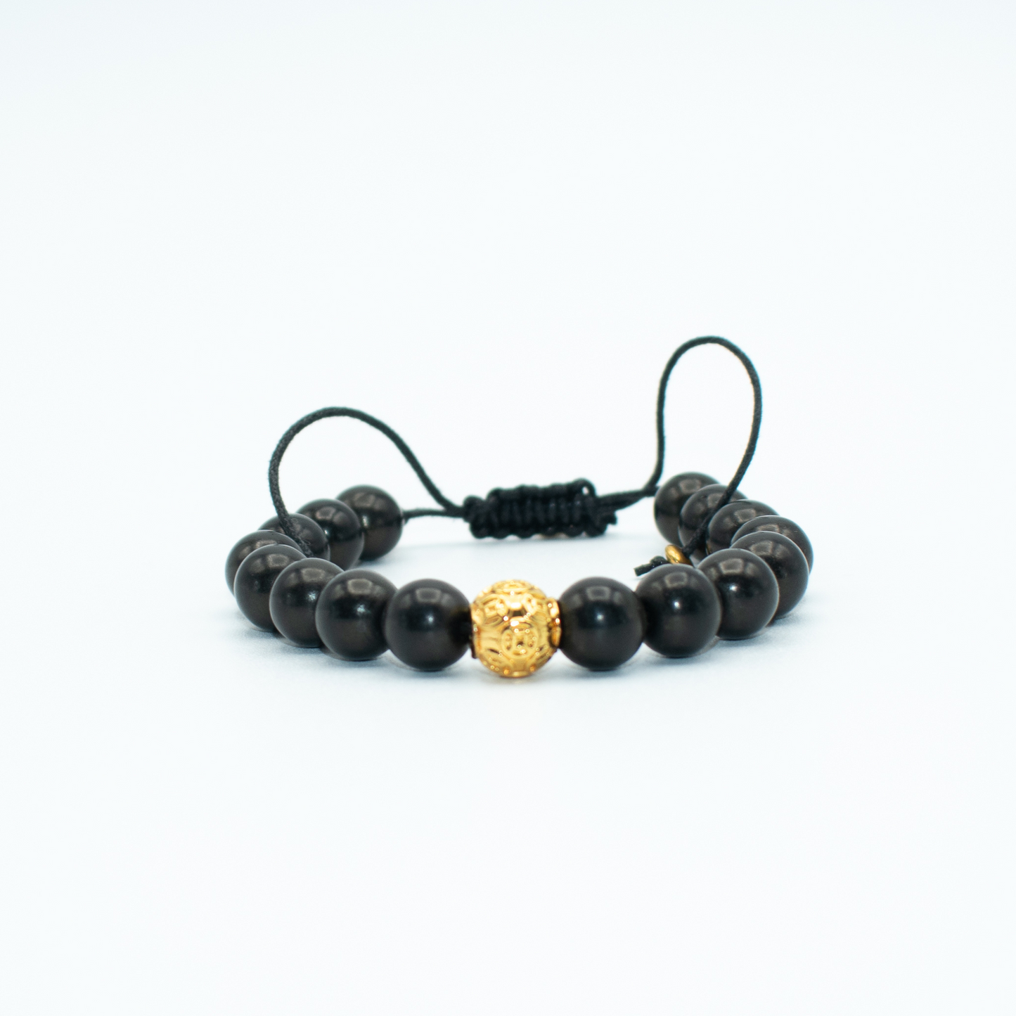 PRODUCT DETAILS 10mm Howlite Stones 10mm Gold Plated Mantra Charm Black Adjustable 0.9 oz Handmade in USA We use premium durable materials and stones in our jewelry. All pieces may vary slightly in color, shape, and size. Please measure your wrist before you make your purchase for an accurate fit. You will receive a free: Storage box or bag and cleaning cloth with your order. 
